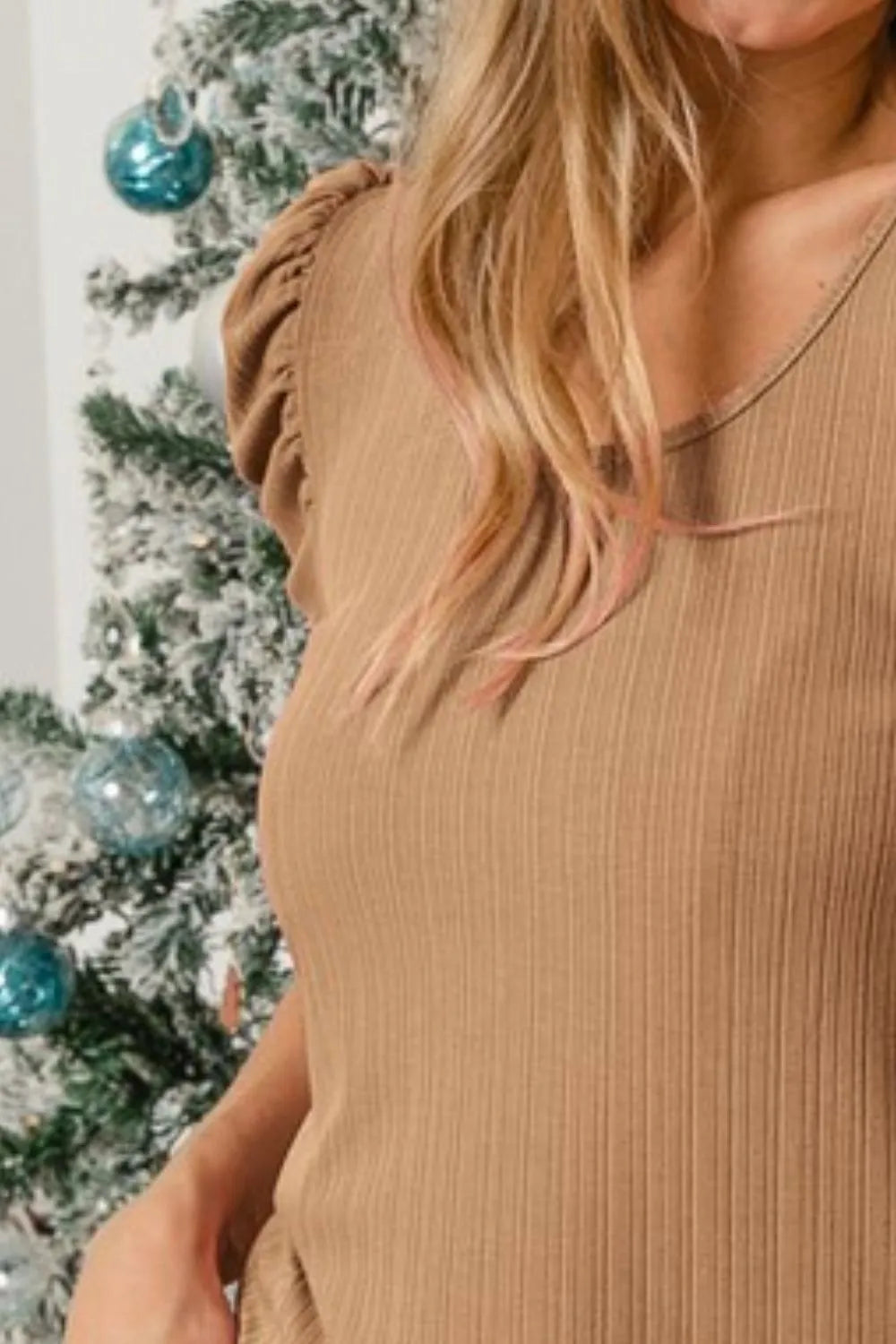 BiBi variegated rib knit puff sleeve shorts top by Trendsi, featuring a textured fabric, puff sleeves, and a relaxed fit.