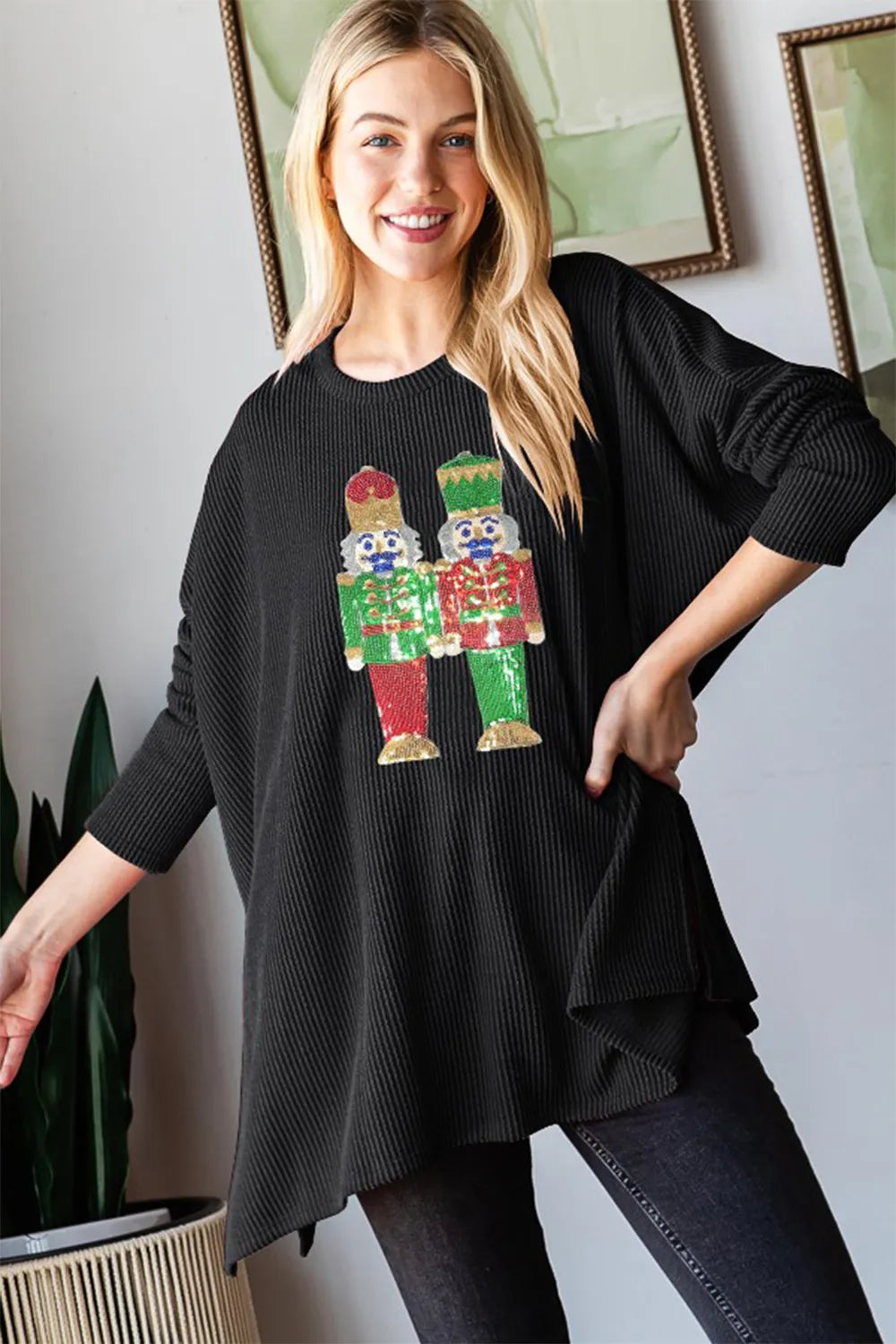Black long sleeve ribbed top with sequin nutcracker