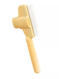 Self-cleaning Slicker pet hair remover brush from Trendsi with fine metal bristles for grooming cats and dogs.