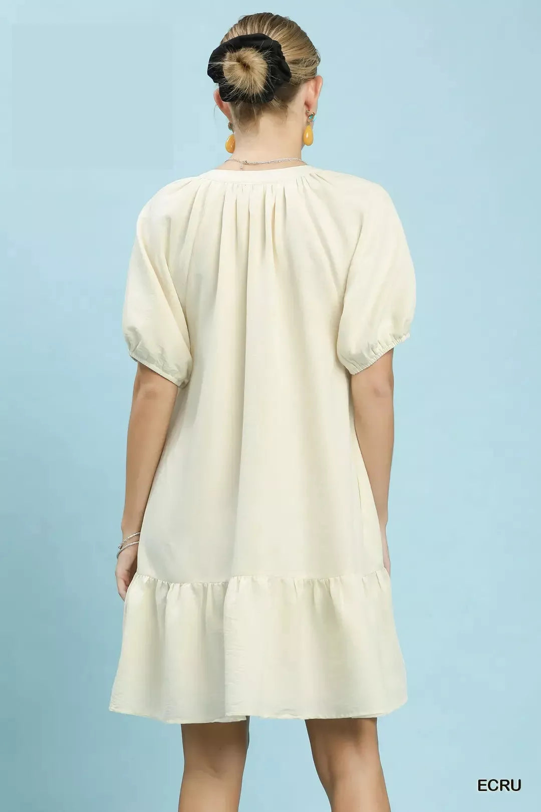 Umgee floral embroidered babydoll dress with lightweight fabric and delicate embroidery, perfect for casual or dressy occasions.