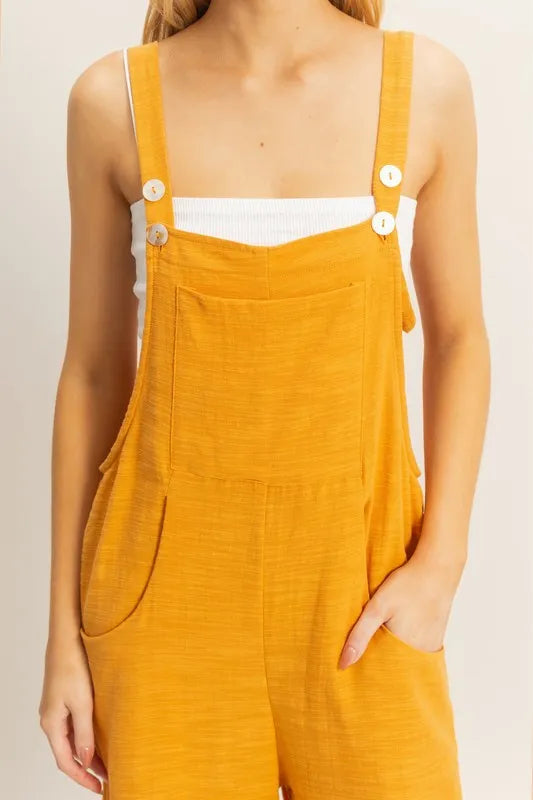 Textured wide-leg overall from HYFVE by Trendsi, featuring a relaxed fit and stylish design with visible fabric texture.