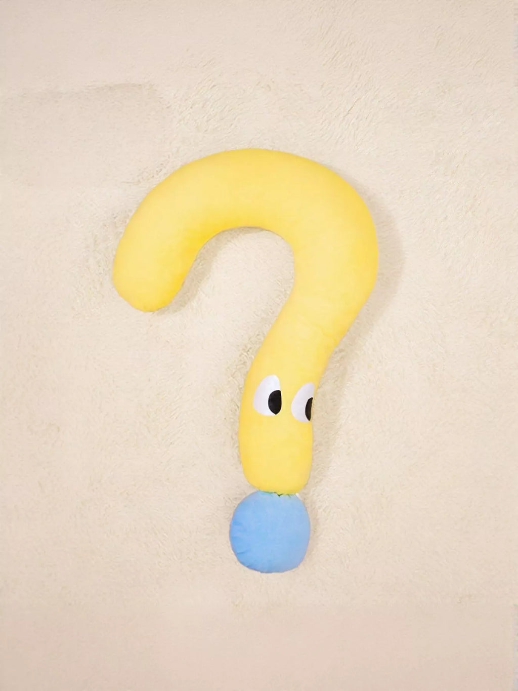 Soft plush pet bed shaped like a question mark from Trendsi, featuring cozy cushioning and playful design for small pets.