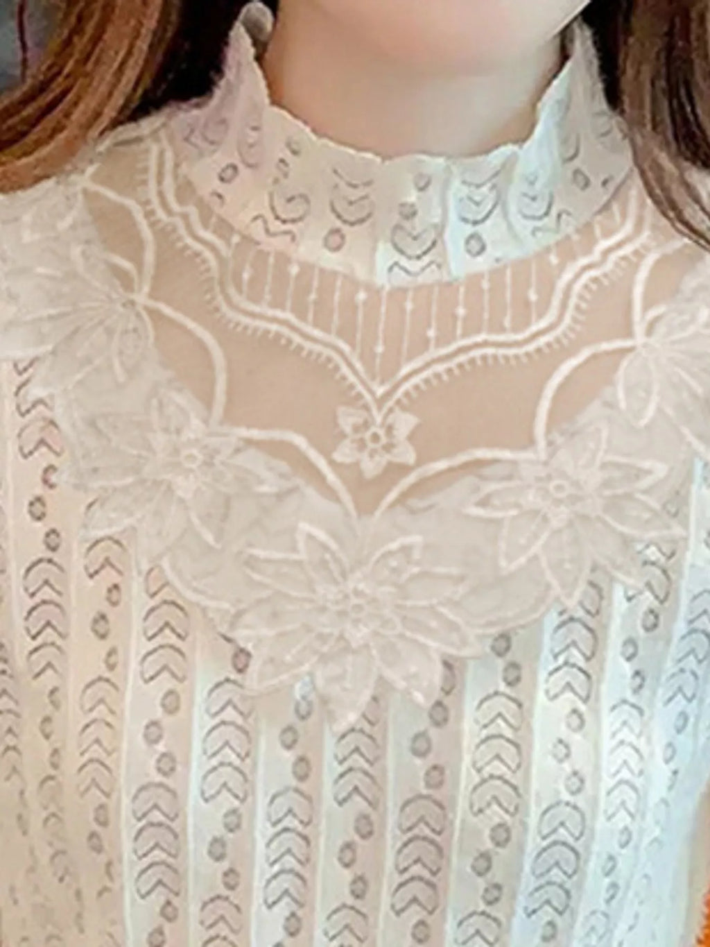 Plus size elegant mock neck lace blouse with sheer floral detailing, stylish full size top from Trendsi.