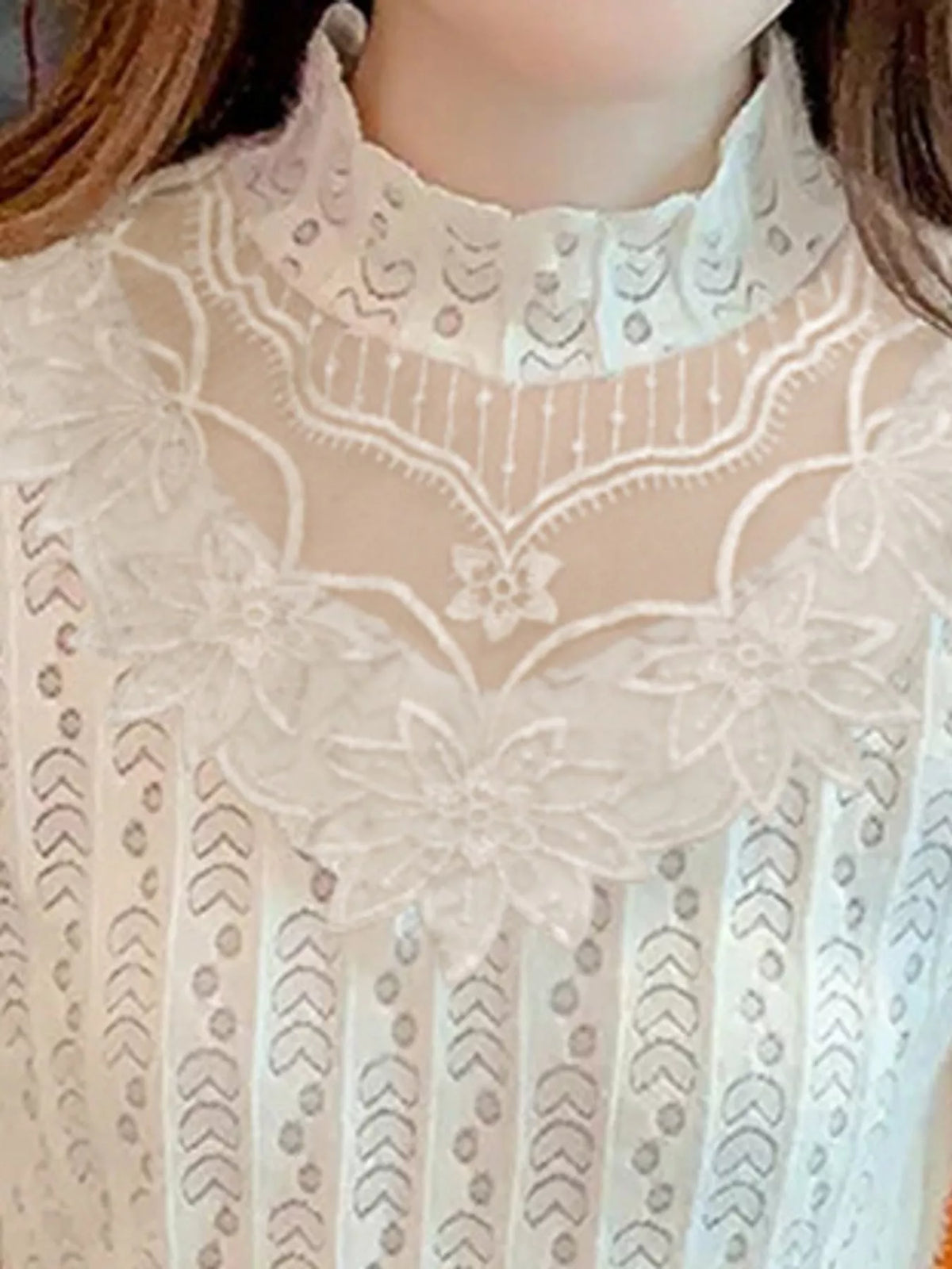 Plus size elegant mock neck lace blouse with sheer floral detailing, stylish full size top from Trendsi.
