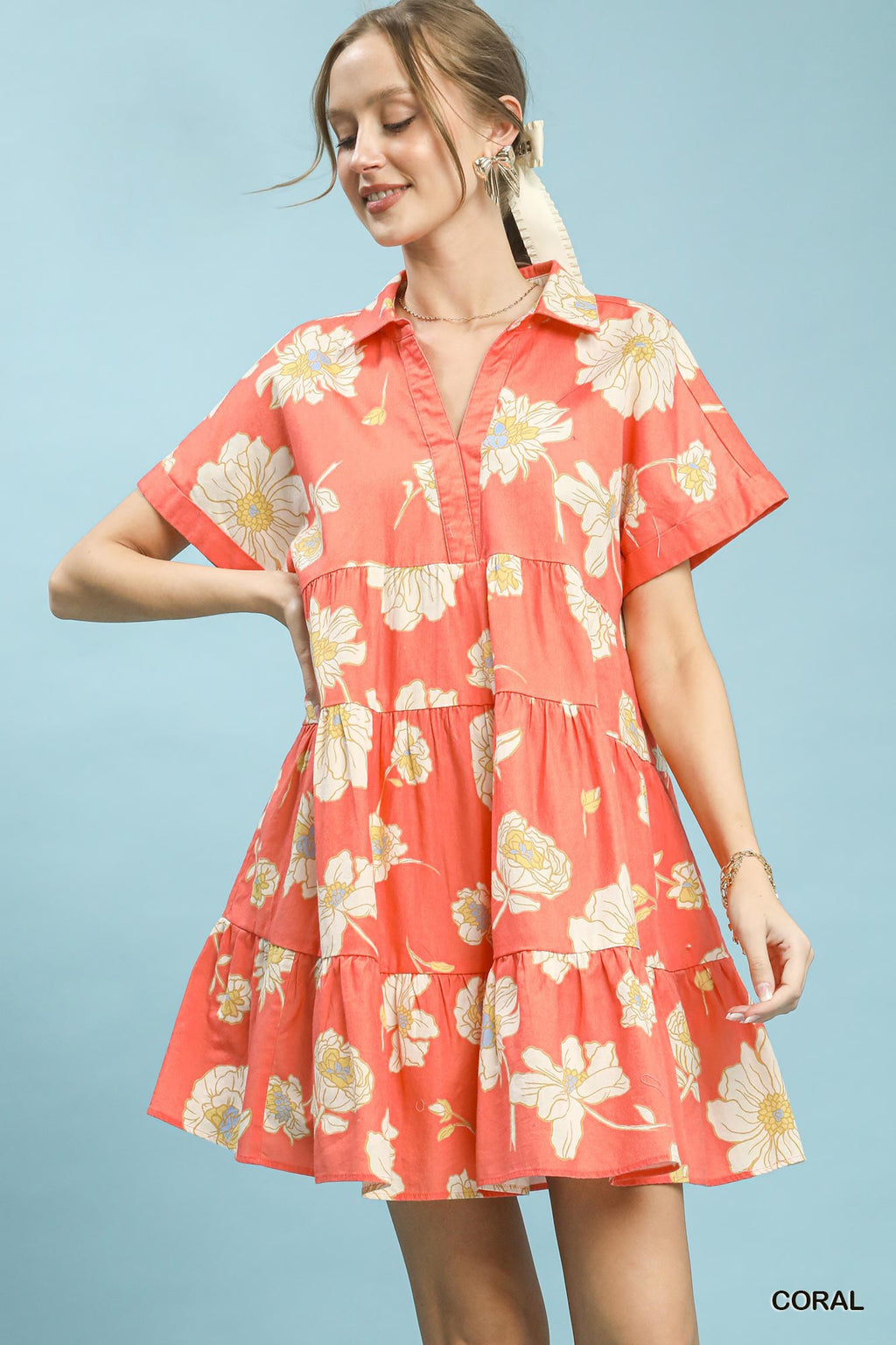 Umgee floral tiered collared babydoll dress, lightweight fabric, fitted bodice, and flowy skirt with floral print.