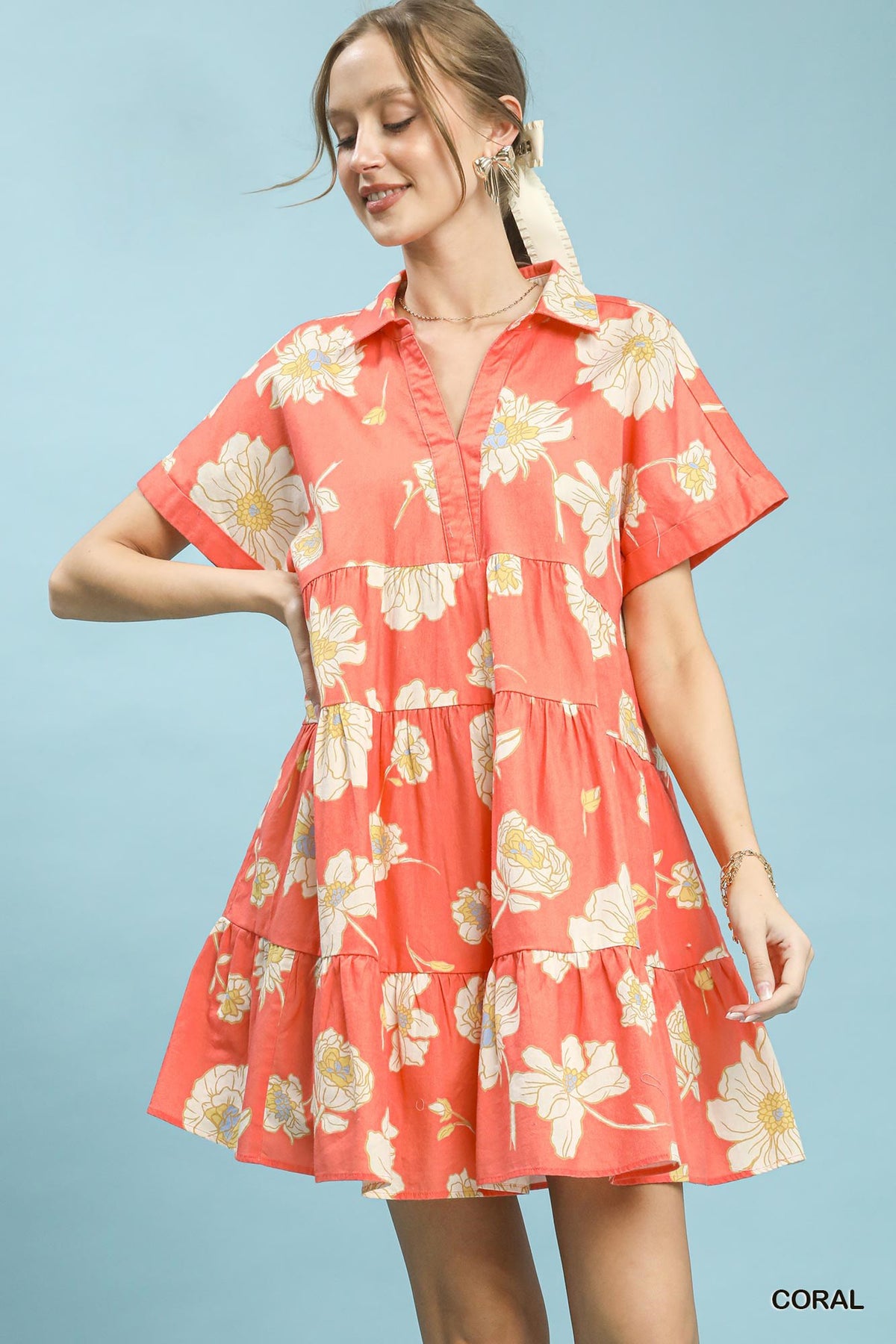 Umgee floral tiered collared babydoll dress, lightweight fabric, fitted bodice, and flowy skirt with floral print.