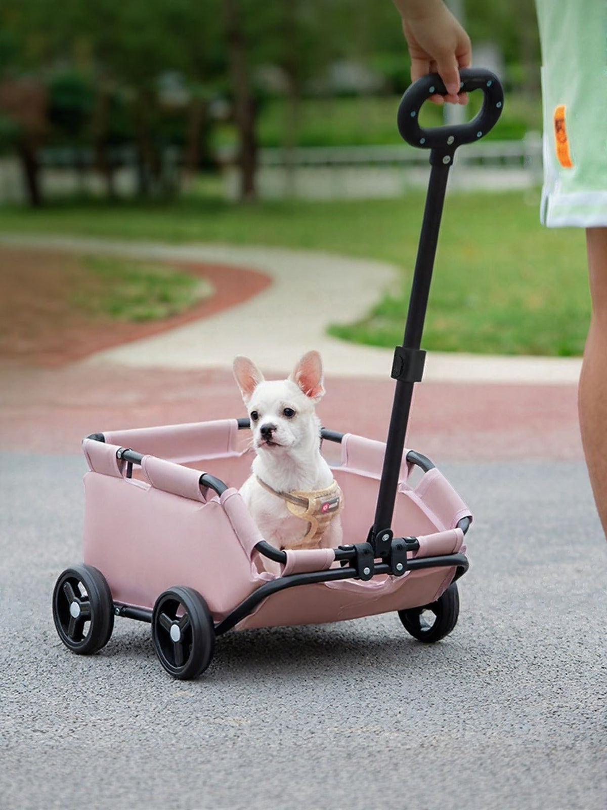 Portable folding pet stroller wagon by Trendsi with mesh sides and handle for easy transport of small pets.