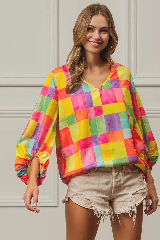 Colorful BiBi Multi Block Bubble Pop Balloon top by Trendsi, featuring vibrant bubbles and playful design for kids' fashion.