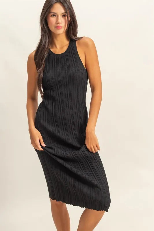 HYFVE ribbed knit bodycon dress with round neckline, form-fitting design, in black, styled on a model.