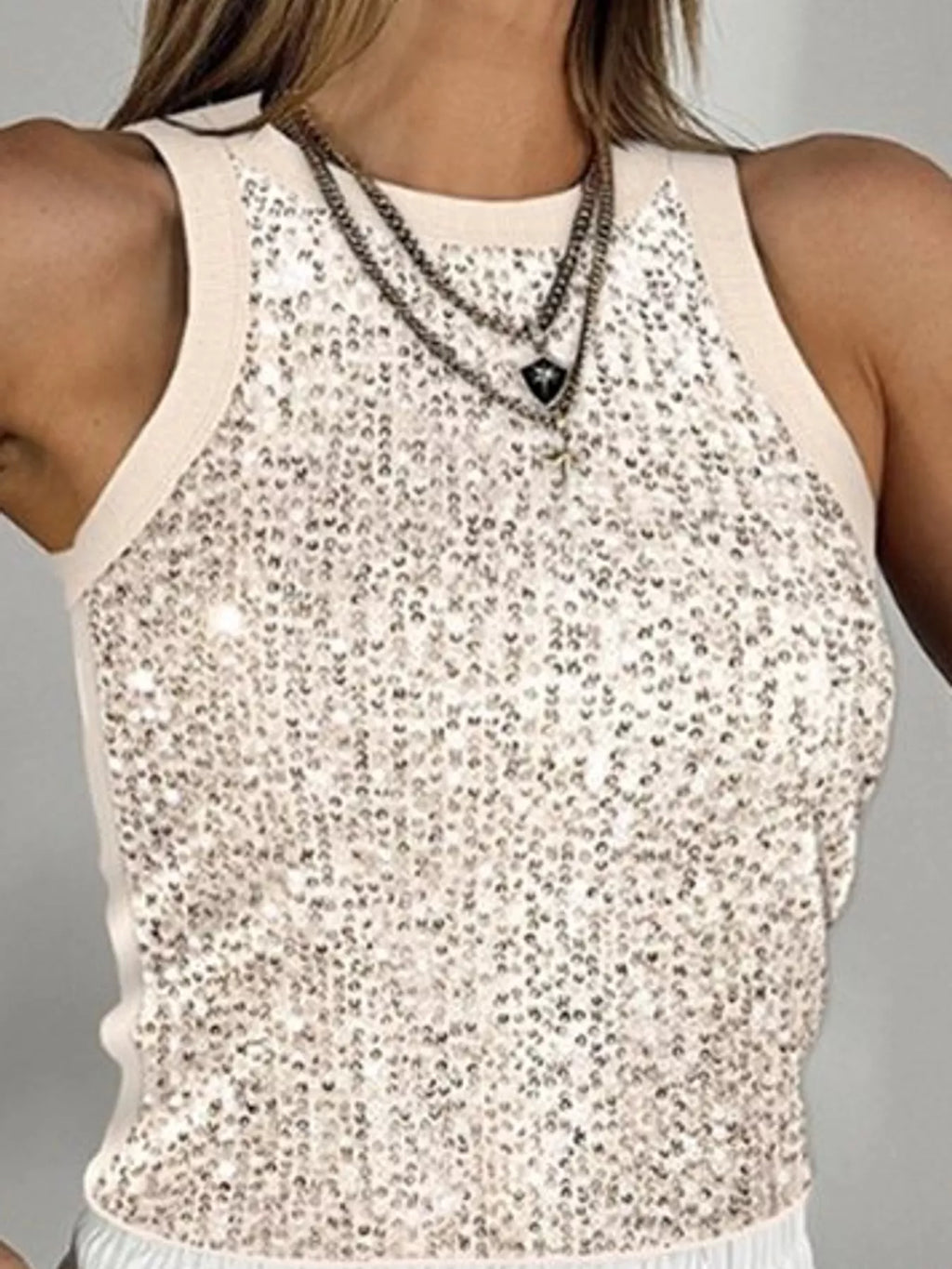 Sequin round neck tank top by Trendsi, featuring shiny sequins and a classic fit, displayed on a white background.