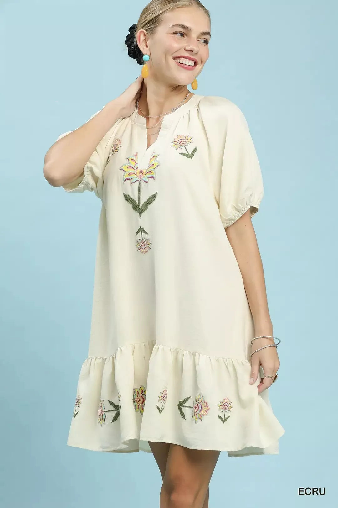 Umgee embroidered floral babydoll dress featuring intricate embroidery and a flowy silhouette, perfect for casual or summer wear.