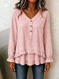 Long sleeve blouse with ruffled hem in soft fabric, featuring a stylish design from Trendsi.