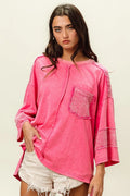 Washed BiBi high-low T-shirt by Trendsi, featuring a casual fit with a rounded neckline and uneven hem for a trendy look.
