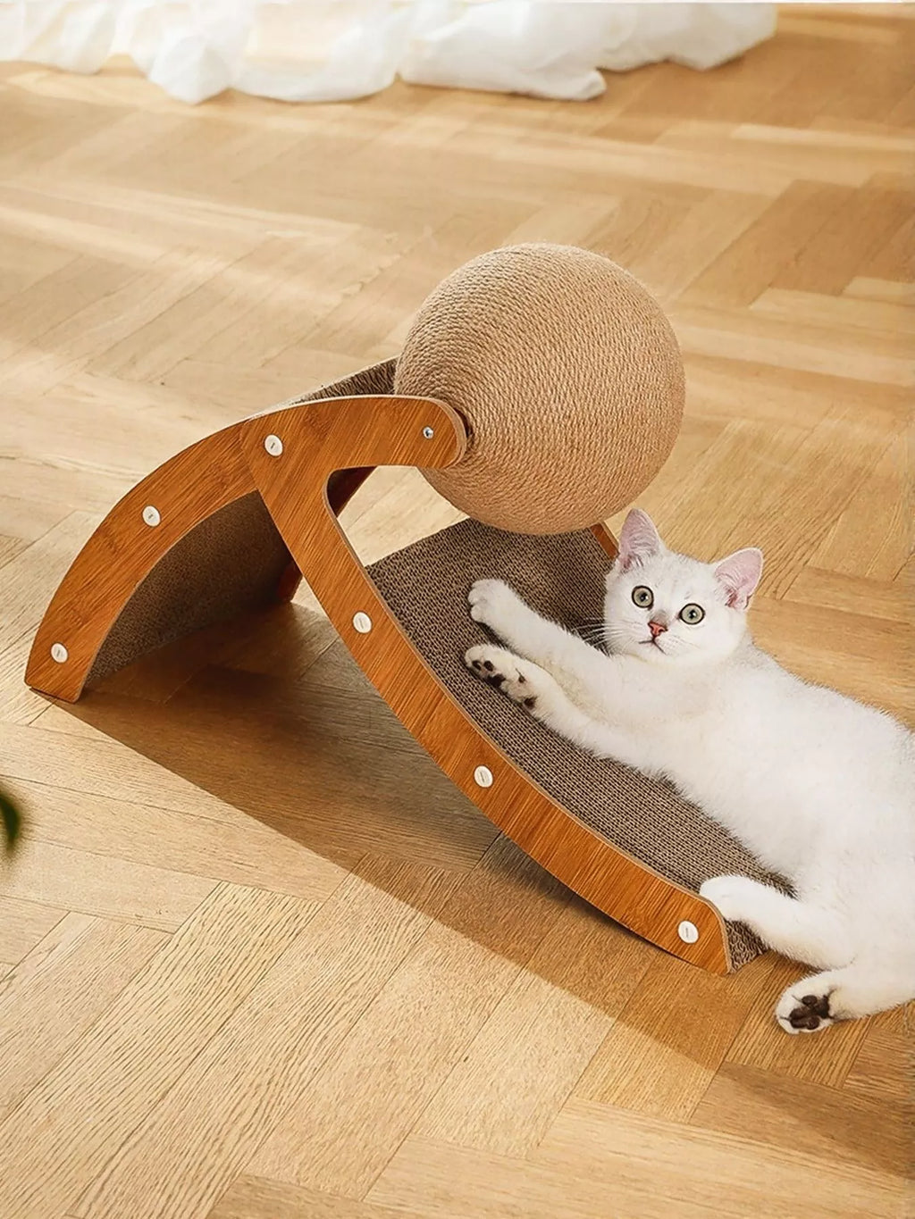 Interactive ball and ramp cat scratching post by Trendsi with colorful design and textured surfaces for feline entertainment.