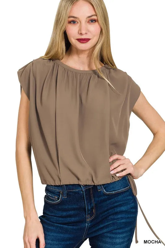 Woven sleeveless top with drawstring tie side detail, Zenana brand, featuring a relaxed fit and casual style.