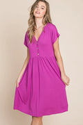 V-neck short sleeve dress by Trendsi, featuring a stylish, lightweight design ideal for casual or semi-formal wear.