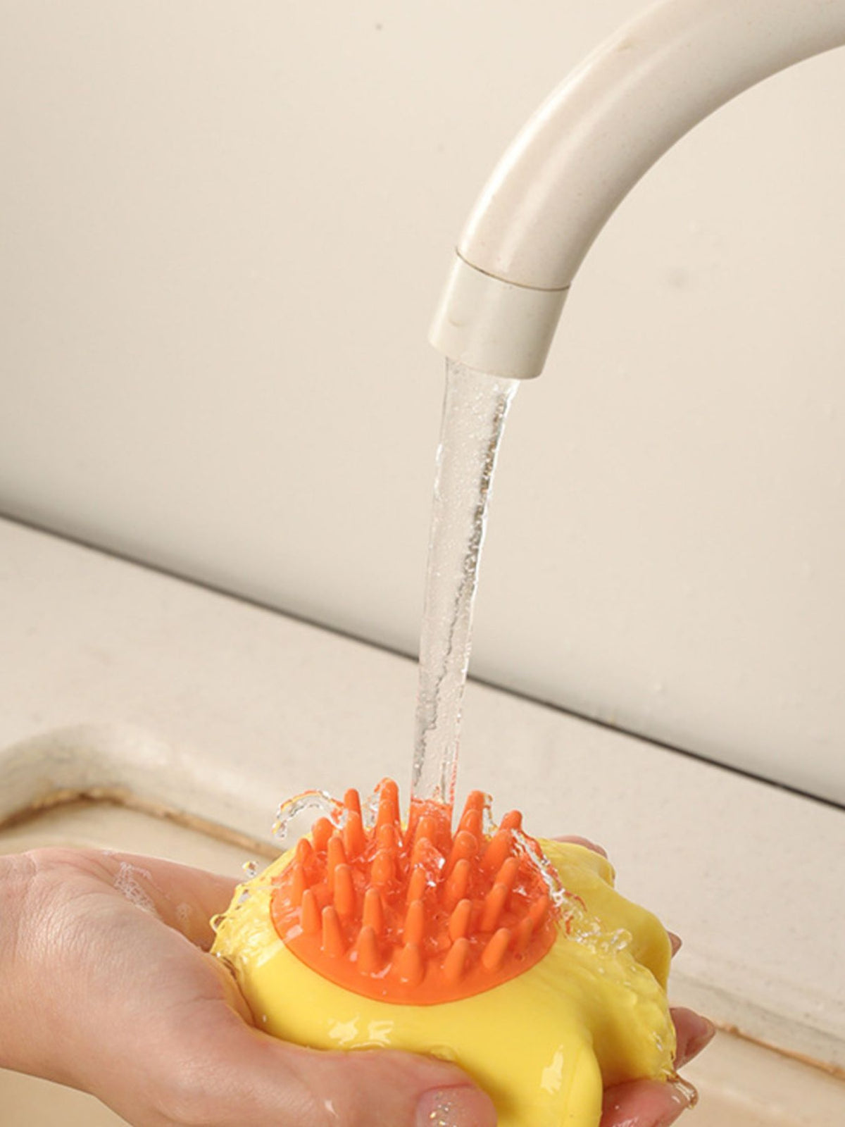 Soft pet shower brush by Trendsi with gentle bristles for easy bathing and grooming of cats and dogs.