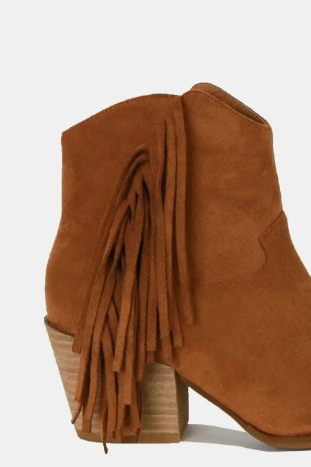 Beast Fashion suede fringe point toe ankle boots by Trendsi featuring a stylish fringe design and sleek ankle-height silhouette.