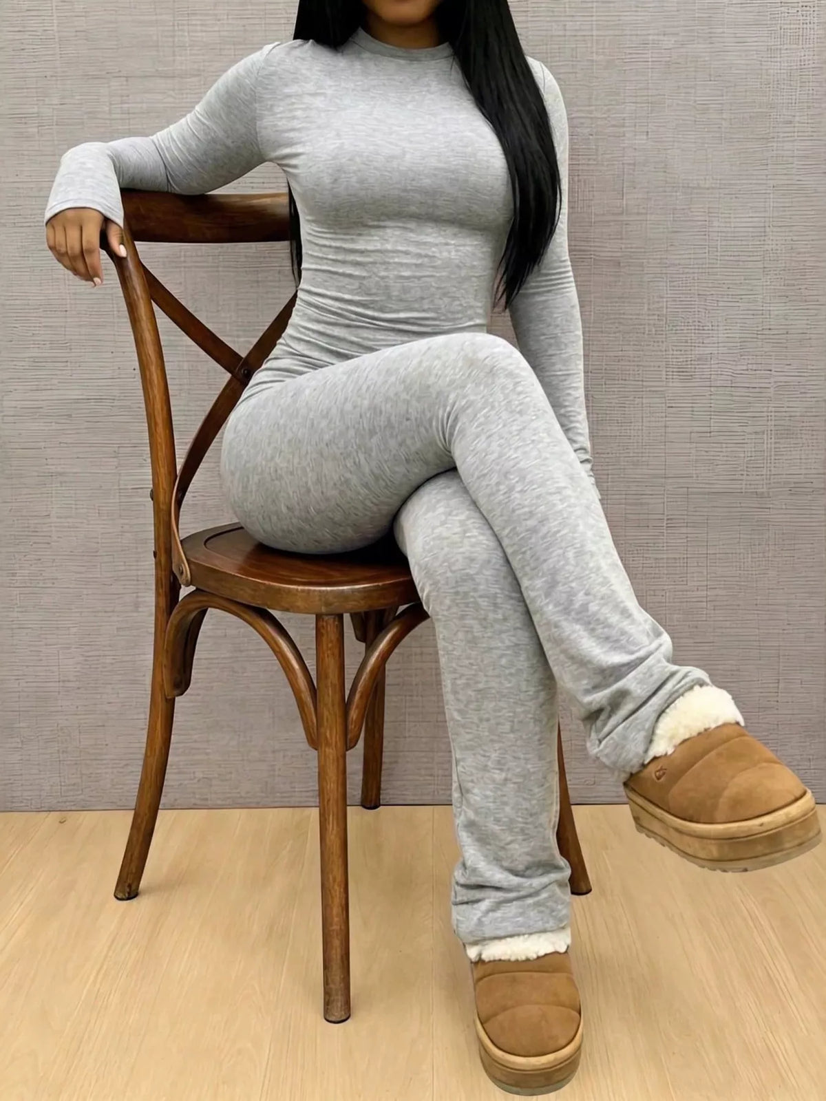 Slim-fit long sleeve crop top and matching leggings lounge set by Trendsi, black color, shown on a model.