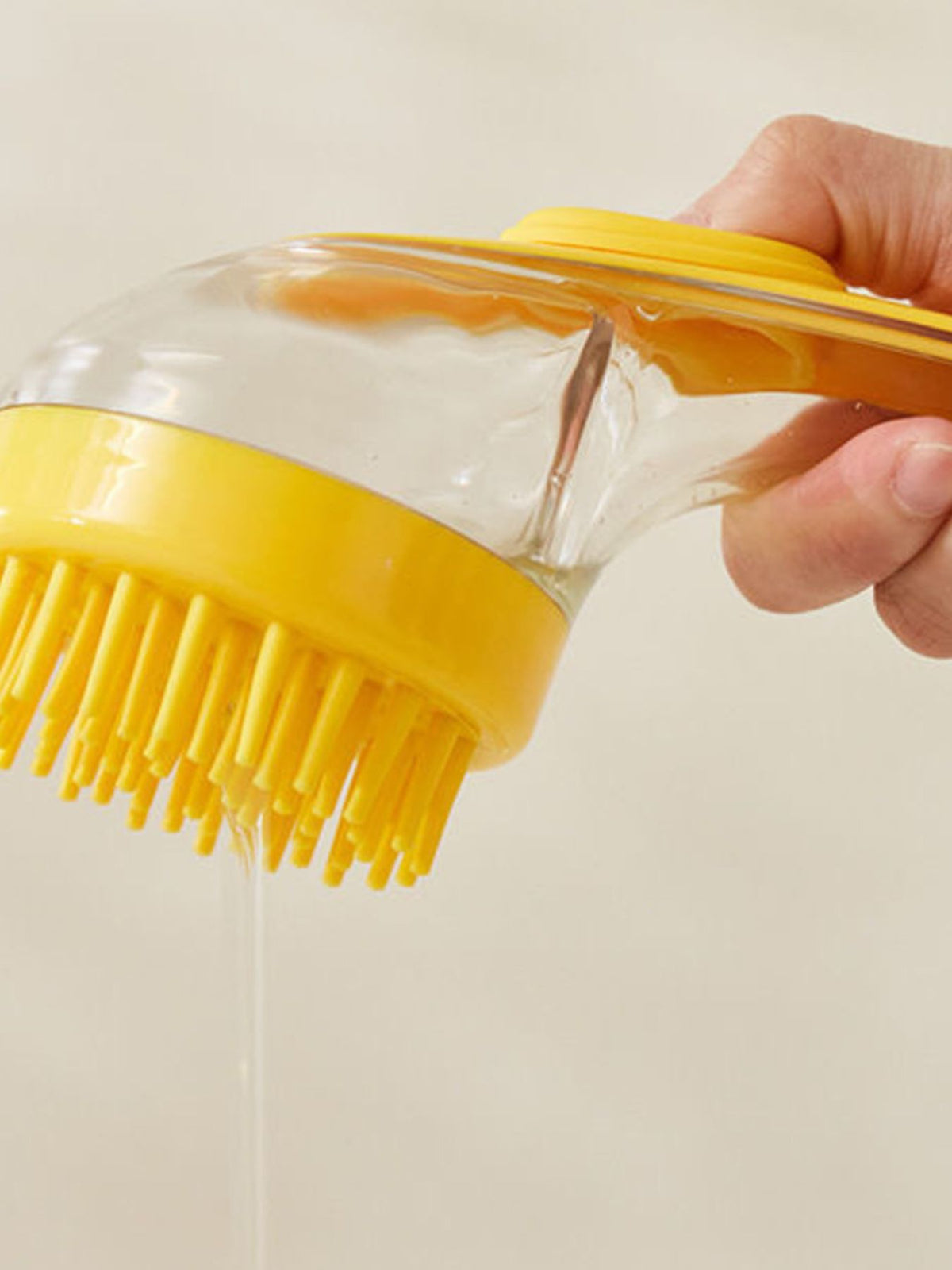 Soft pet shower brush by Trendsi, showing flexible bristles and ergonomic handle, ideal for gentle pet bathing.