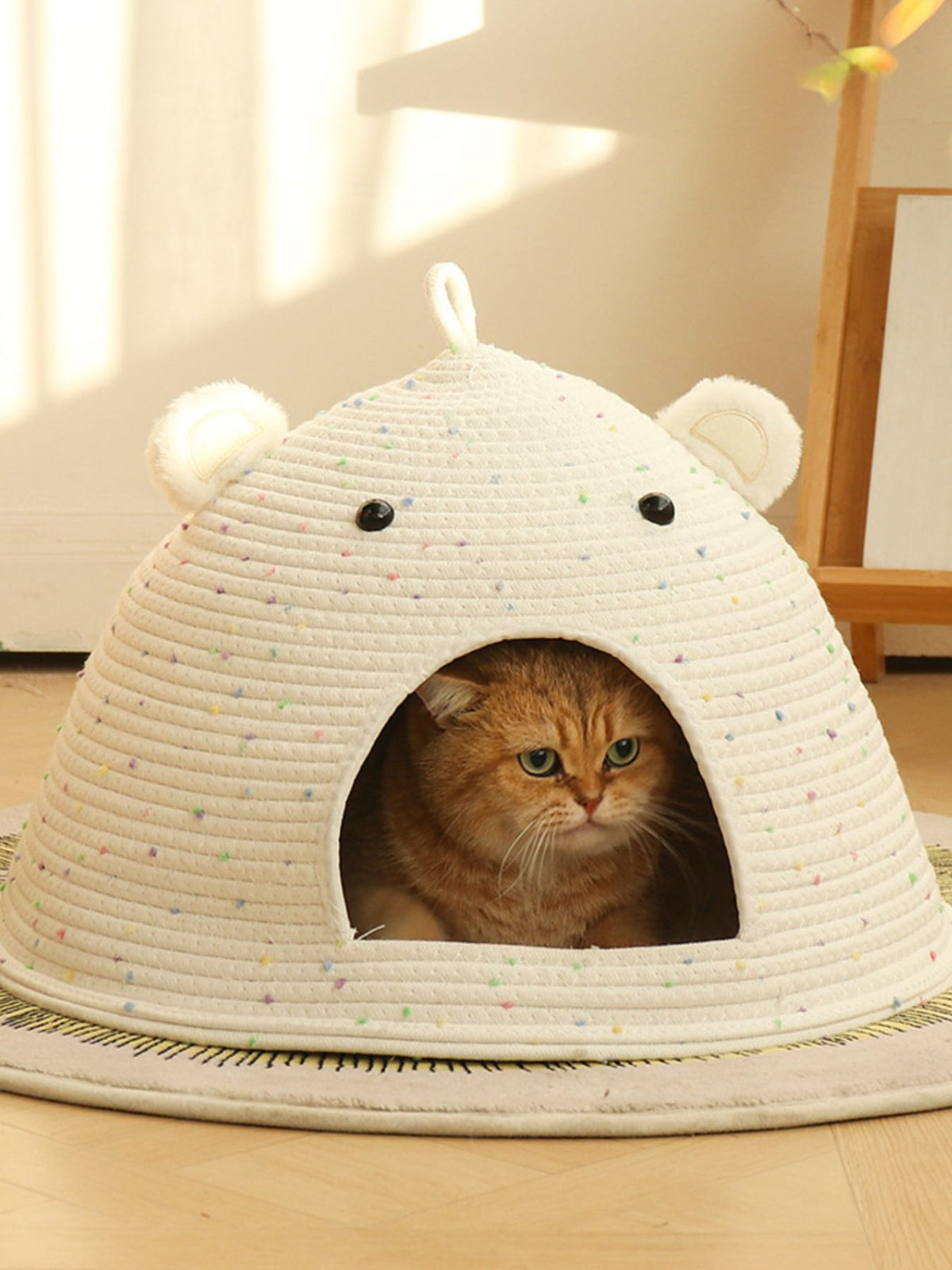 Woven pet nest with bear ear design, soft interior, ideal for small pets, by Trendsi featuring cozy, plush fabric and cute bear ears.