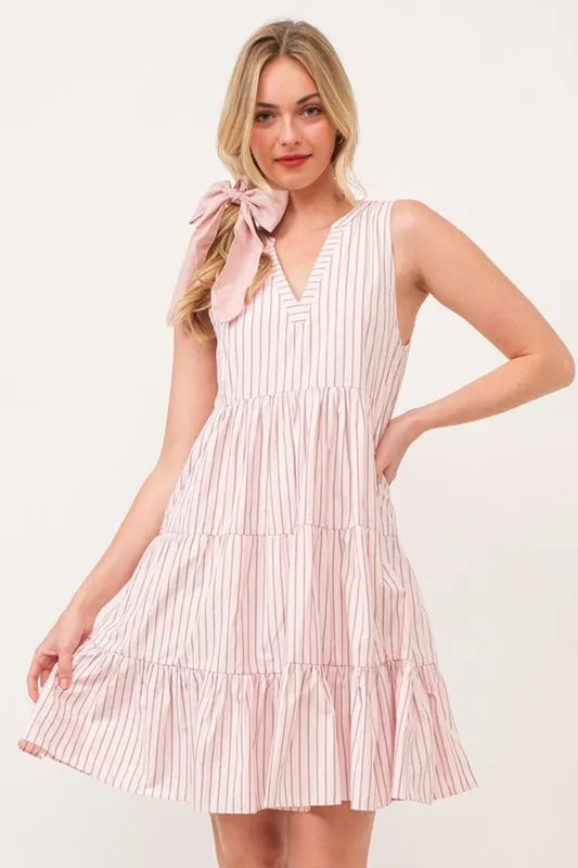 Lime 'N' Chili striped sleeveless V-neck tiered dress by Trendsi, featuring colorful horizontal stripes and tiered fabric design.