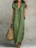Plus size ruffled v-neck cap sleeve maxi dress by Trendsi, full-length with flowing fabric and elegant ruffle details.