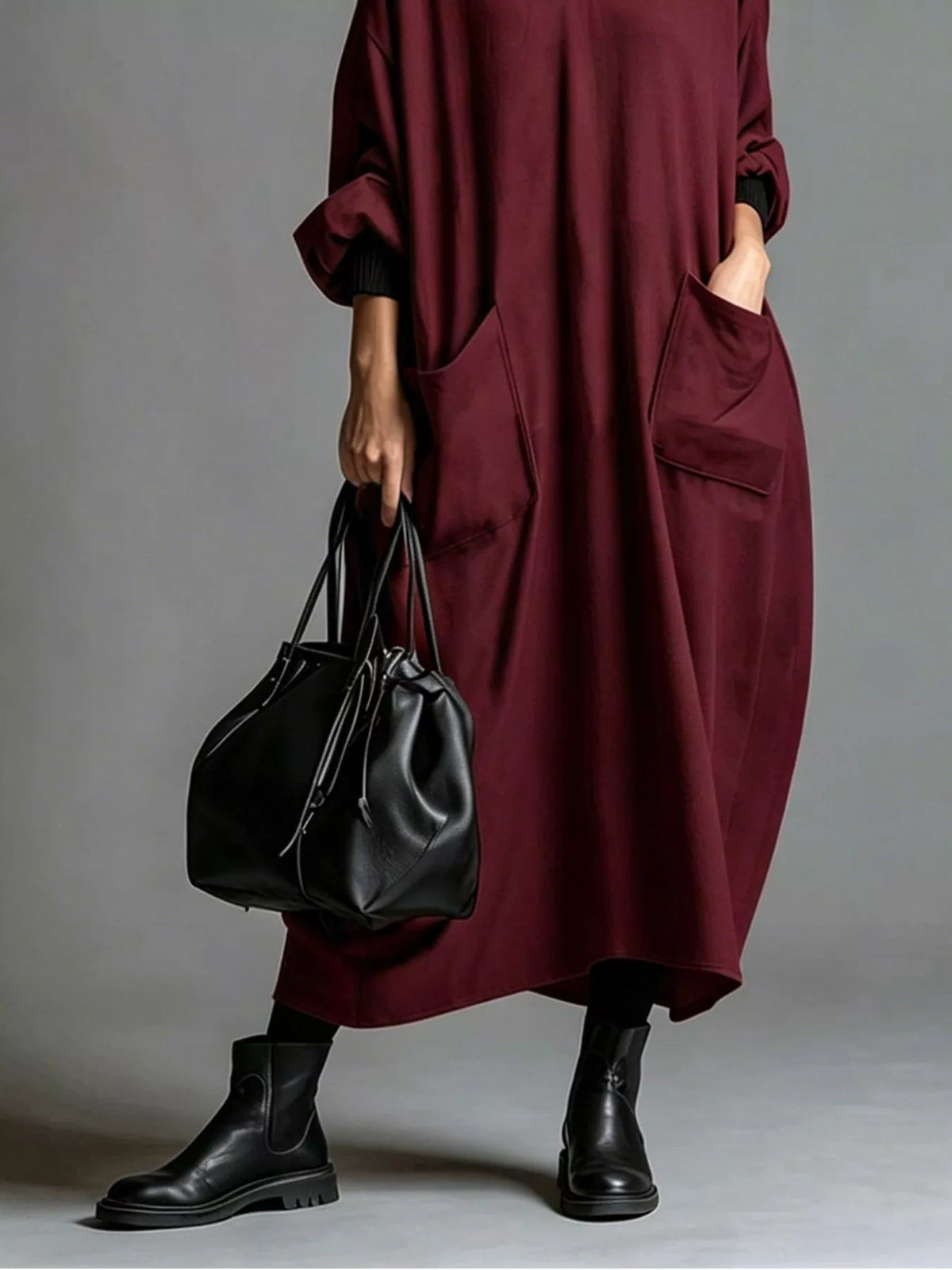 Plus size loose-fit mock neck midi dress with pockets by Trendsi, featuring a full-size, comfortable, casual style.