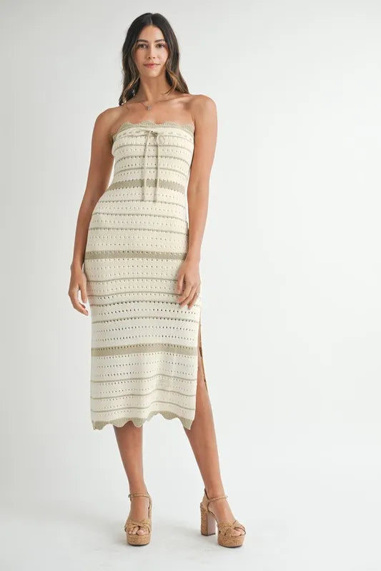 Contrast striped crochet knit midi dress by Trendsi featuring a fitted silhouette and stylish pattern, perfect for casual or dressy occasions.