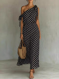 Plus size Trendsi polka dot one-shoulder maxi dress, full-length view showcasing its elegant design and flowing fabric.
