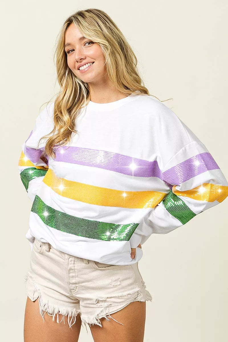 Sequin Mardi Gras striped round neck sweatshirt by Trendsi featuring colorful sequins and a casual fit.