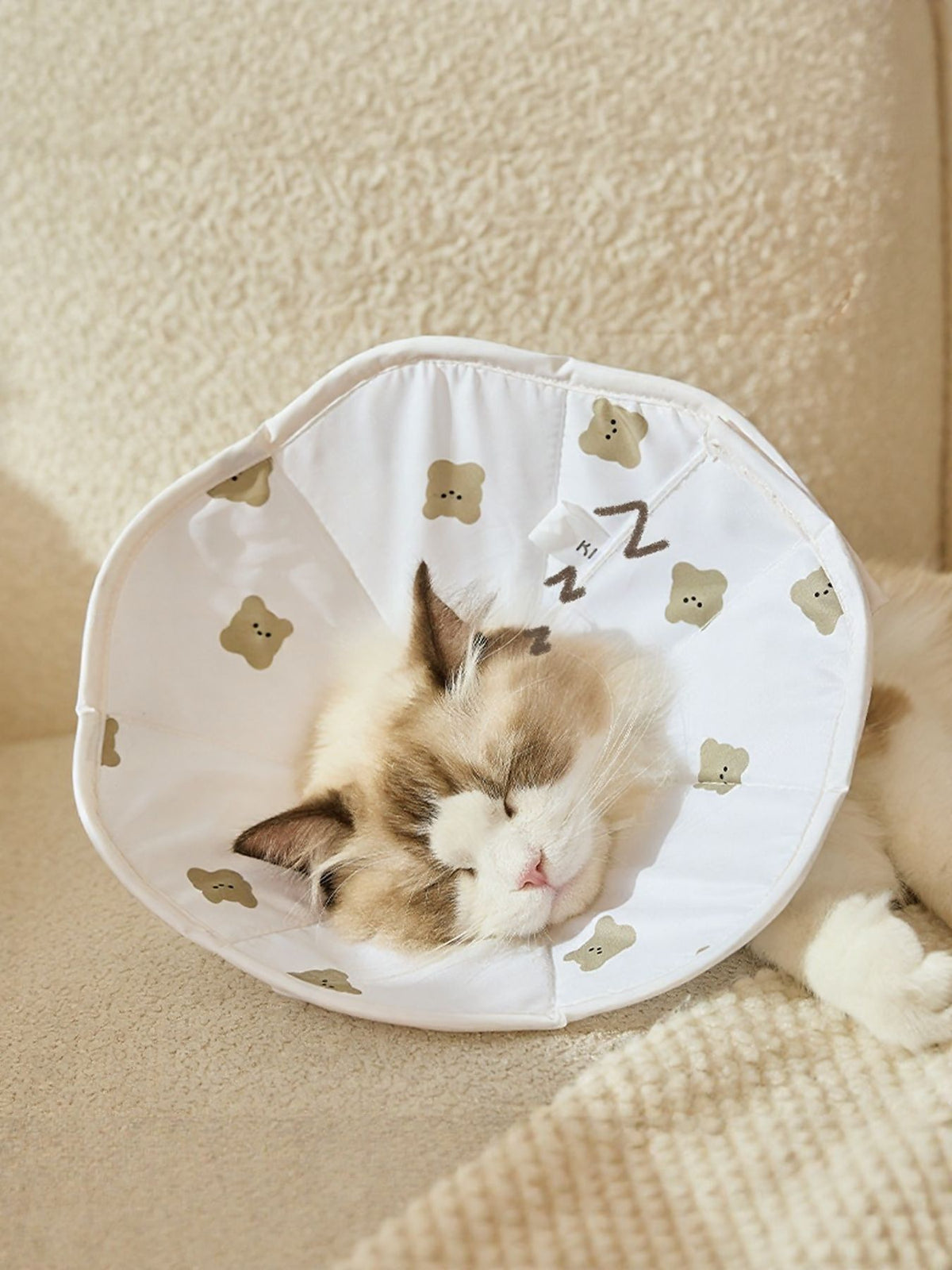 Cute bear pattern protective pet collar from Trendsi, featuring a soft fabric design for cats or small dogs.