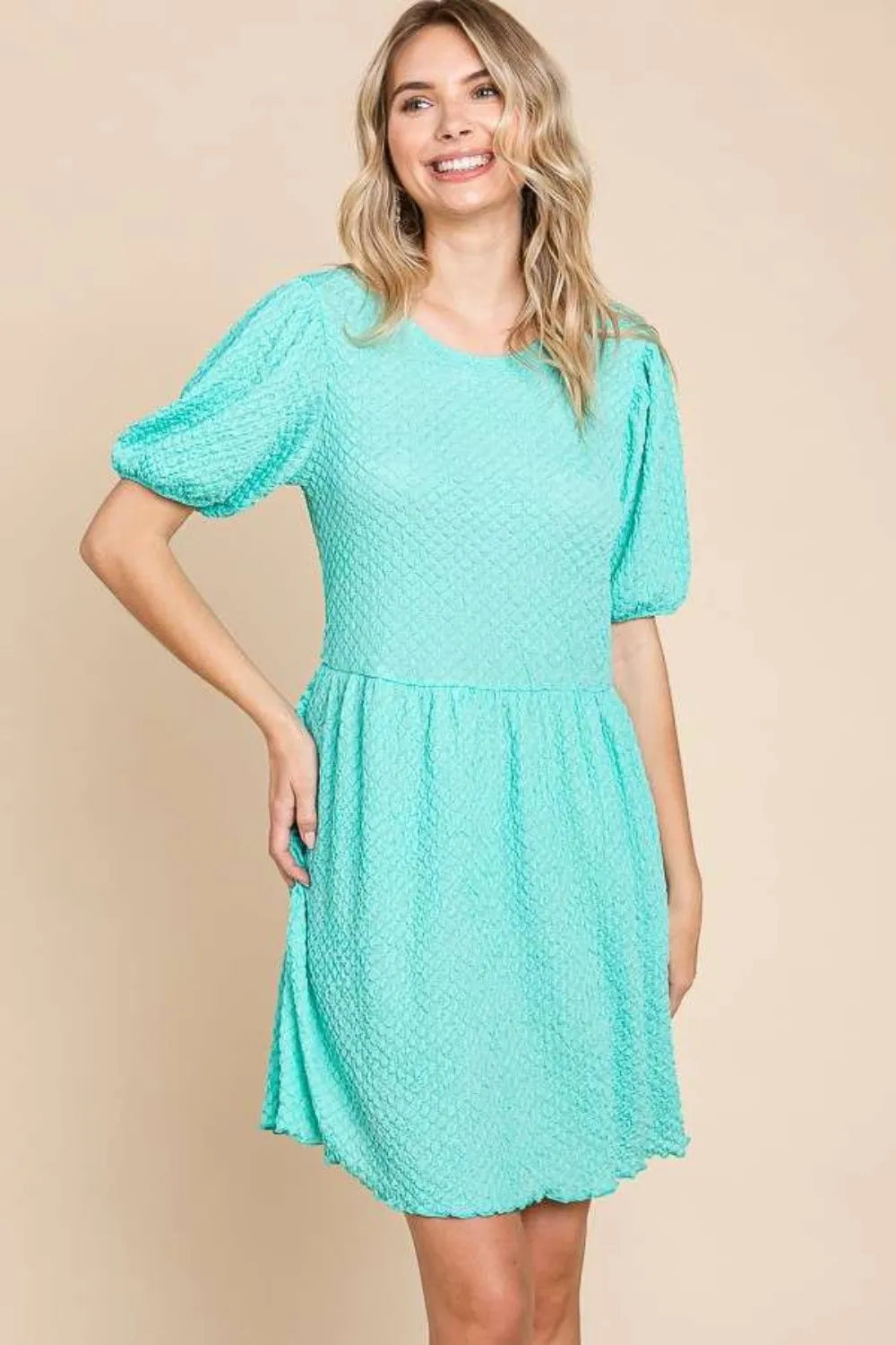 Textured round neck puff sleeve dress by Trendsi featuring a full size fit and stylish textured fabric.
