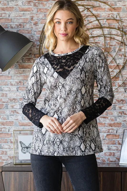 Heimish full size snakeskin print round neck lace contrast top featuring long sleeves and stylish design.