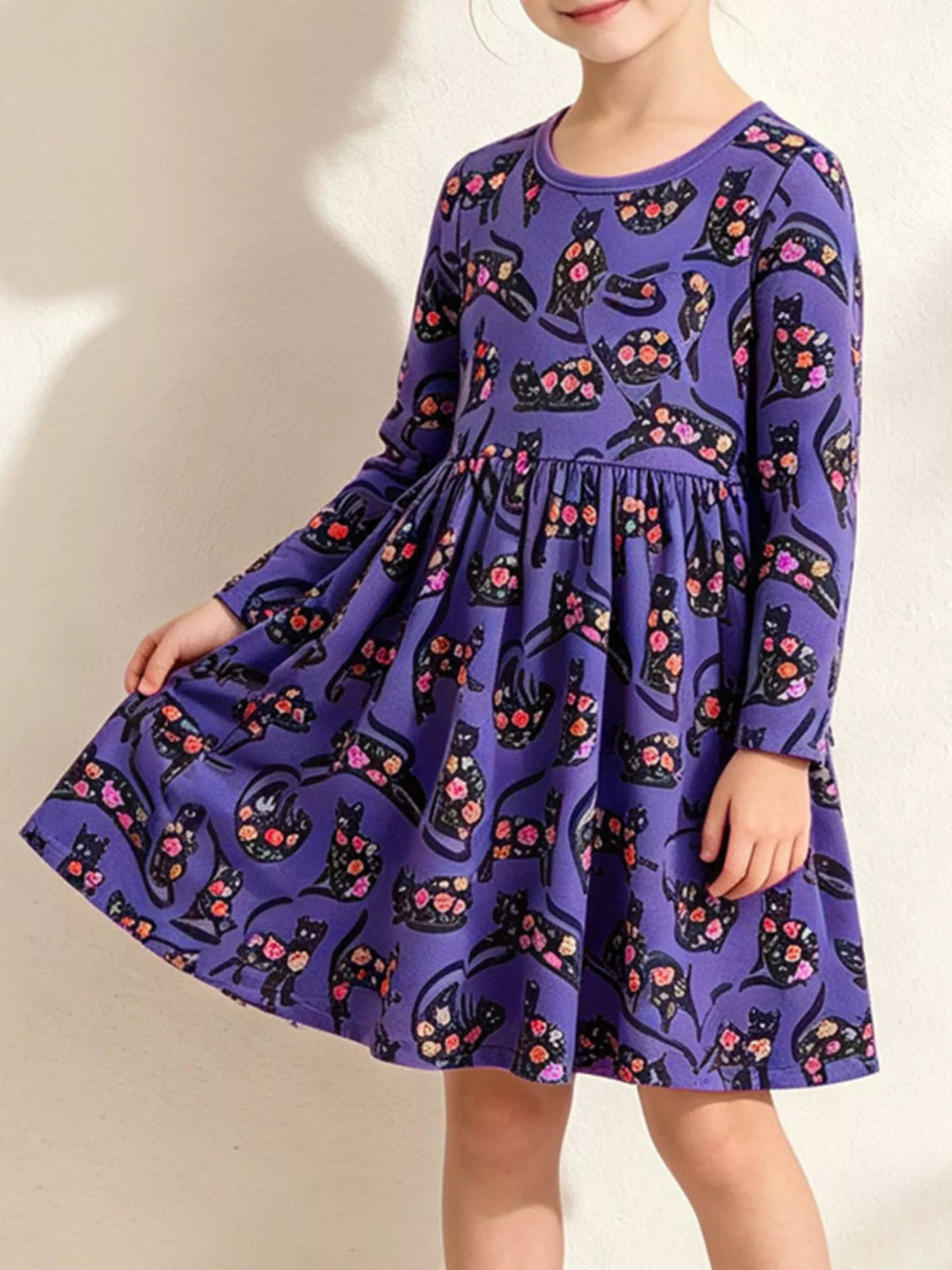 Children's floral cat print long-sleeve A-line casual dress by Trendsi, featuring colorful flower and cat patterns on soft fabric.