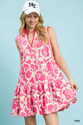 Umgee floral sleeveless tiered dress featuring a flowy silhouette and vibrant floral pattern, perfect for warm weather wear.