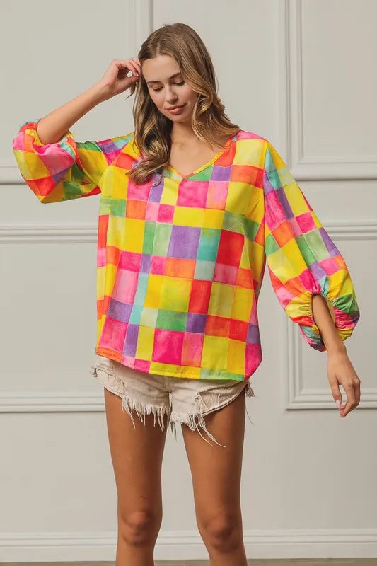 Colorful BiBi Multi Block Bubble Pop Balloon top by Trendsi with vibrant bubble patterns and playful design.