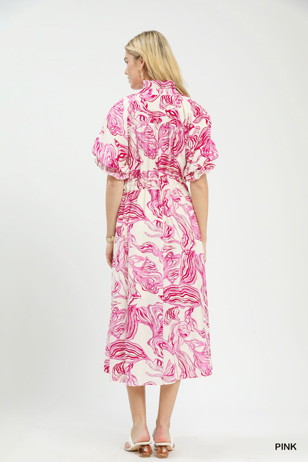 Umgee abstract print smocked tie waist midi dress featuring a flowy silhouette and stylish design.