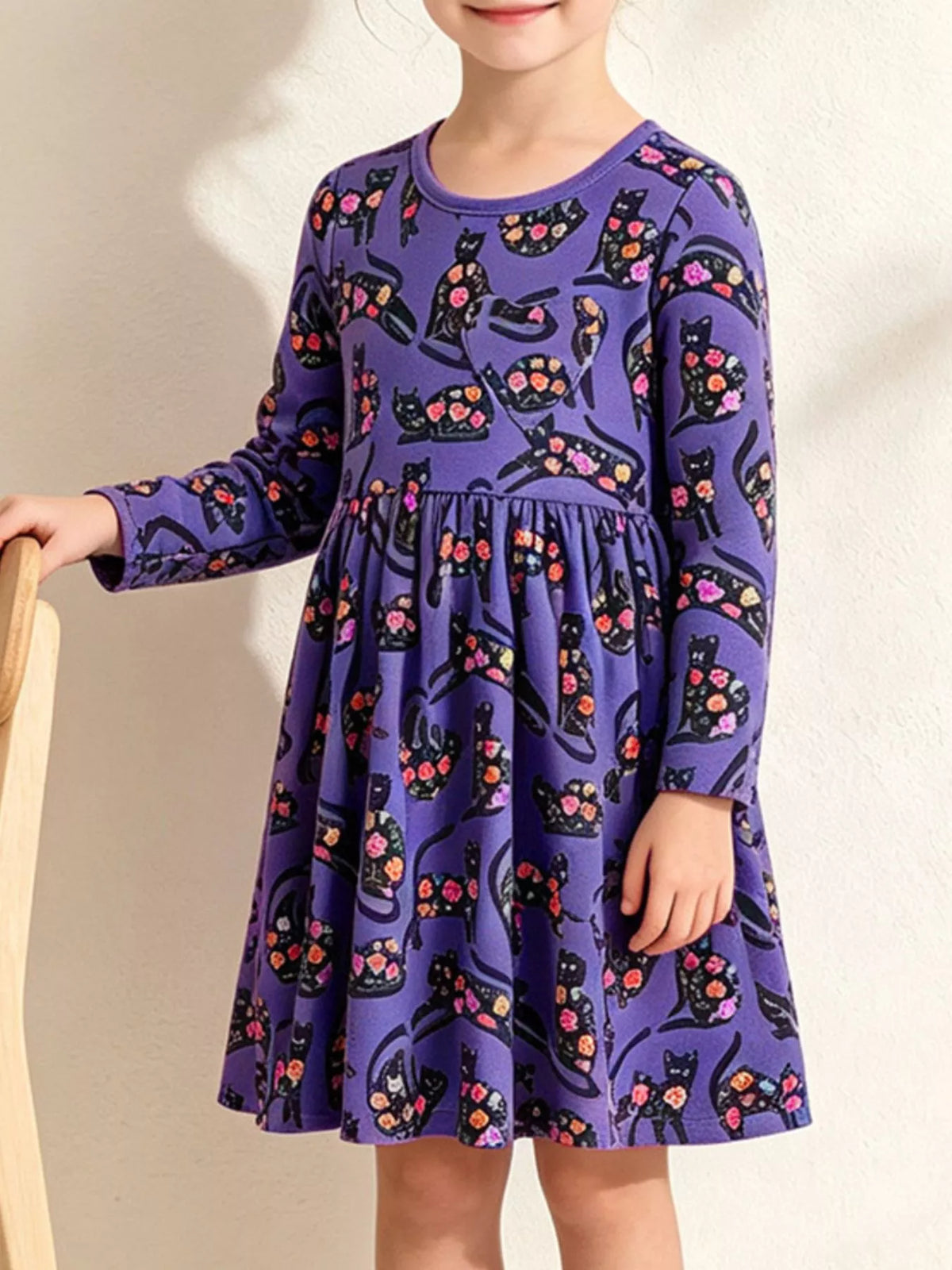 Children's floral cat print long-sleeve A-line casual dress by Trendsi, featuring colorful cat and flower patterns.