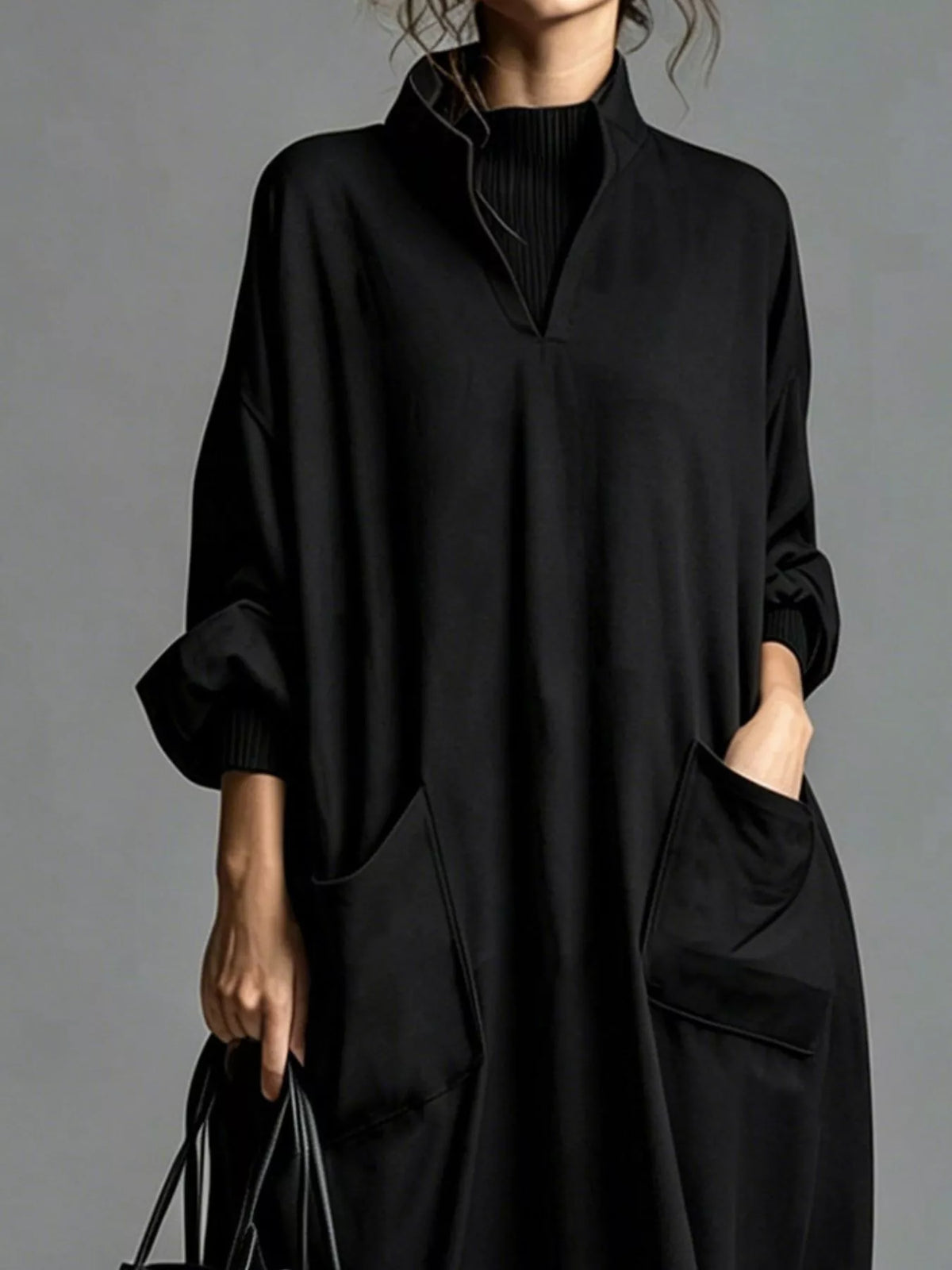 Plus size loose-fit mock neck midi dress with pockets from Trendsi, featuring a full-size, comfortable, casual style.