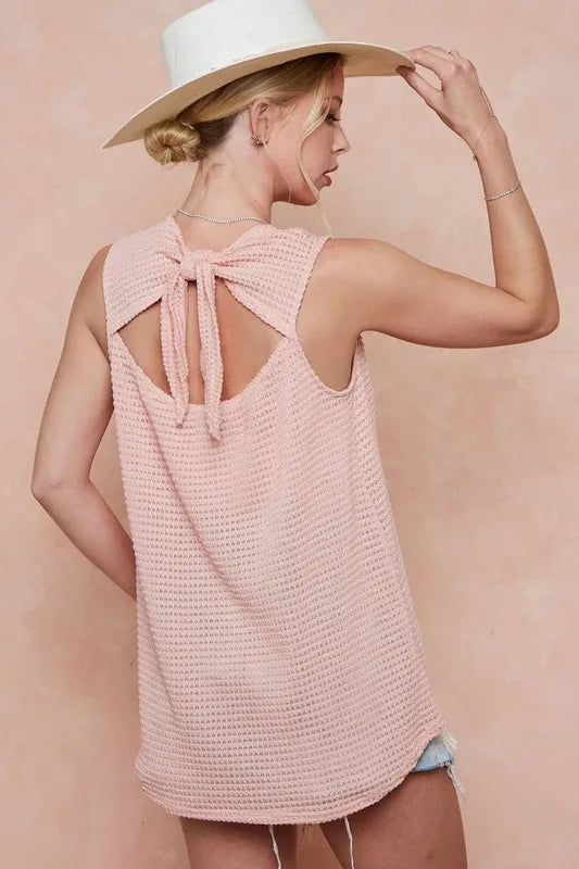 Trendsi BiBi popcorn waffle open back top with tied ribbon, stylish casual blouse featuring a textured waffle fabric and back opening.