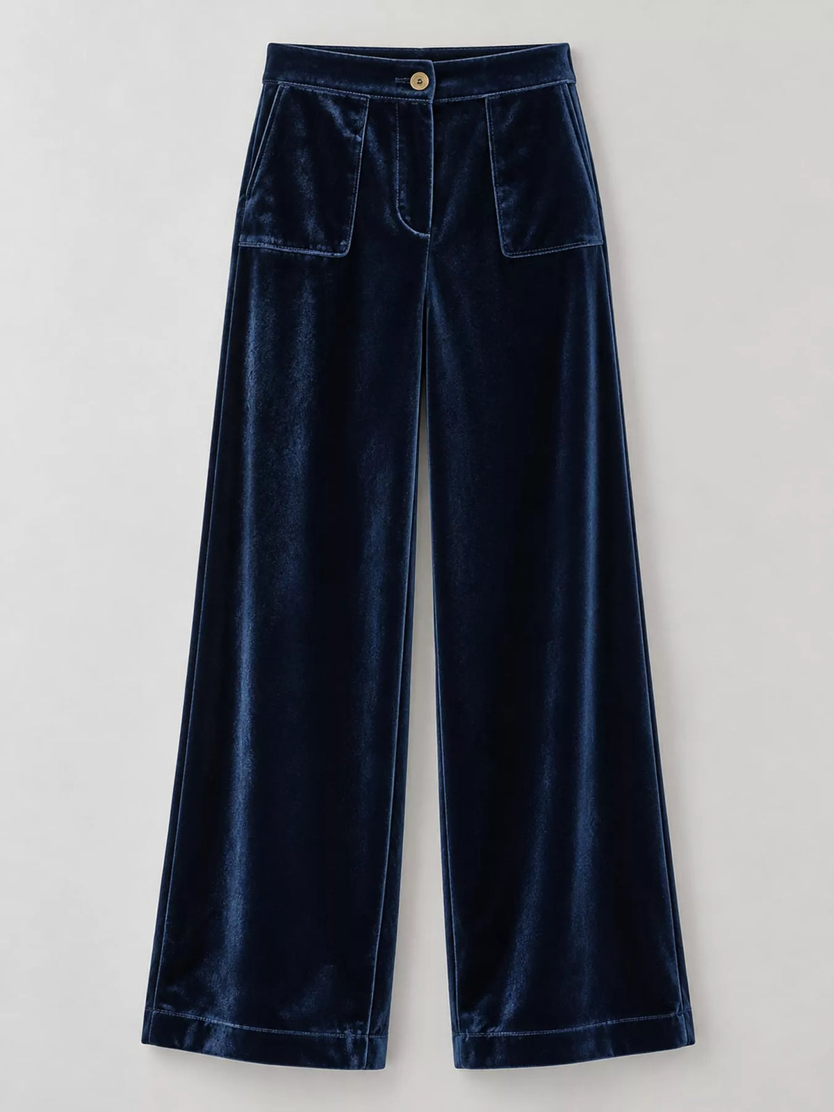 Full size high-waisted wide-leg velvet pants with pockets, plus size, styled with a smooth fabric and relaxed fit.