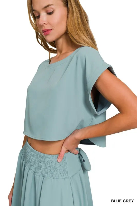 Heavy woven span crop tee and skirt set by Trendsi, featuring a matching coordinated outfit with textured fabric and casual style.