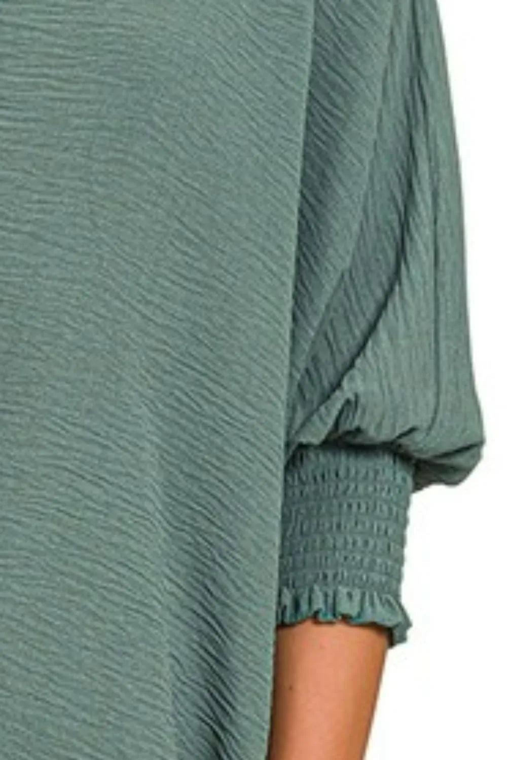 Zenana airflow collar tee with smocked sleeve band, featuring a relaxed fit and lightweight fabric in a casual style.