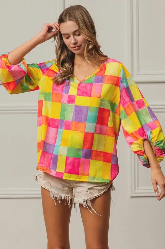 Colorful BiBi Multi Block Bubble Pop Balloon Top by Trendsi, featuring vibrant, playful bubble design and layered fabric details.
