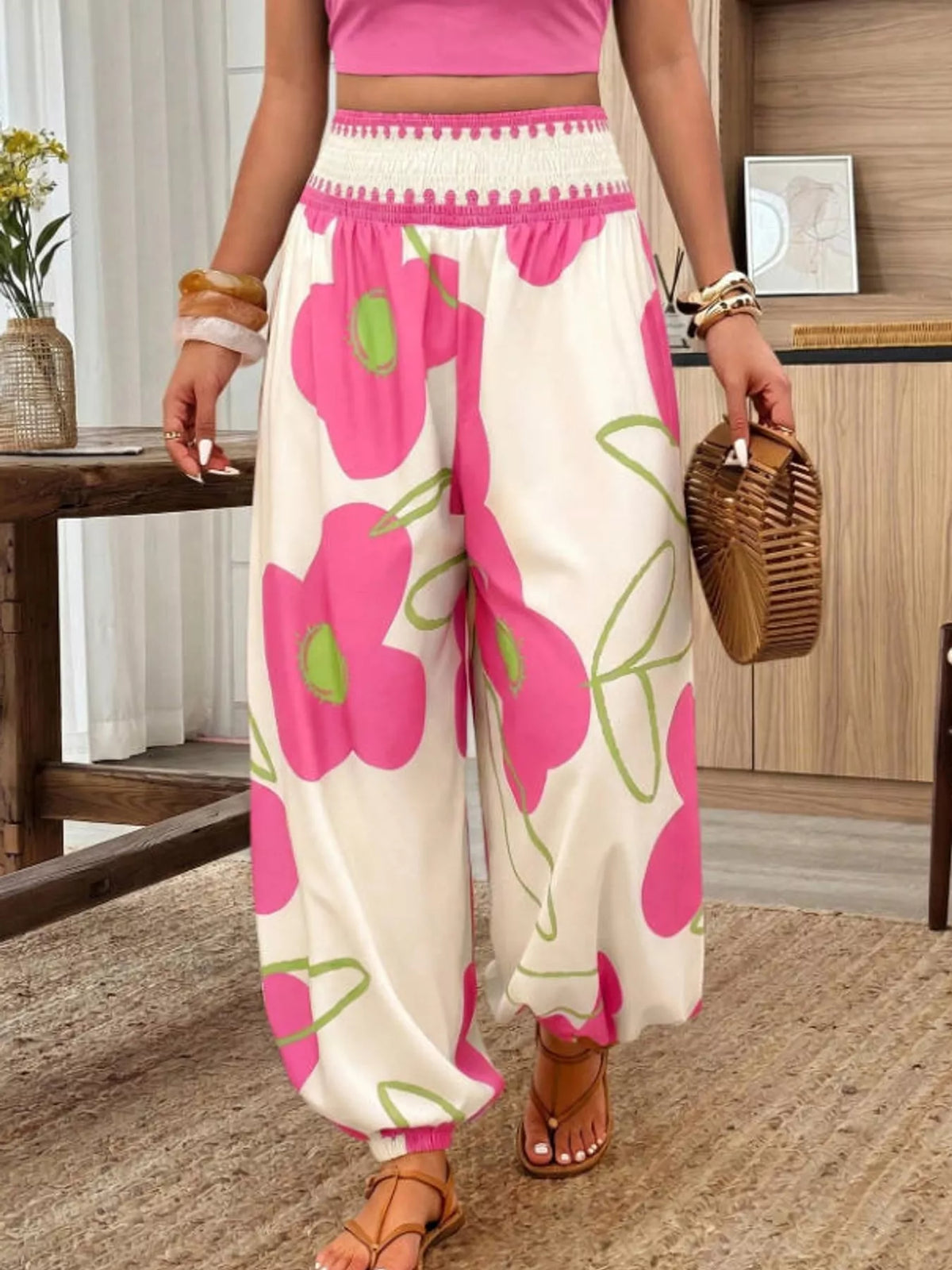 Floral print wide-leg pants from Trendsi featuring a flowy design, vibrant floral pattern, and relaxed fit.