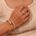 Gold-plated zircon bracelet and ring jewelry set with elegant design, featuring sparkling zircon stones on a stylish gold finish.