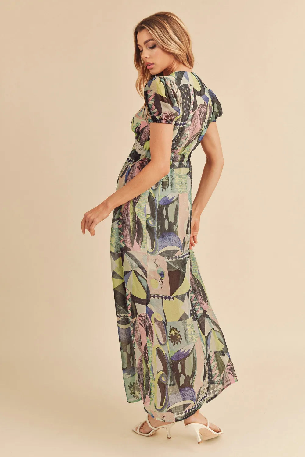 Aemi + Co lace detail slit geometric print short sleeve maxi dress with flowy silhouette and stylish design.