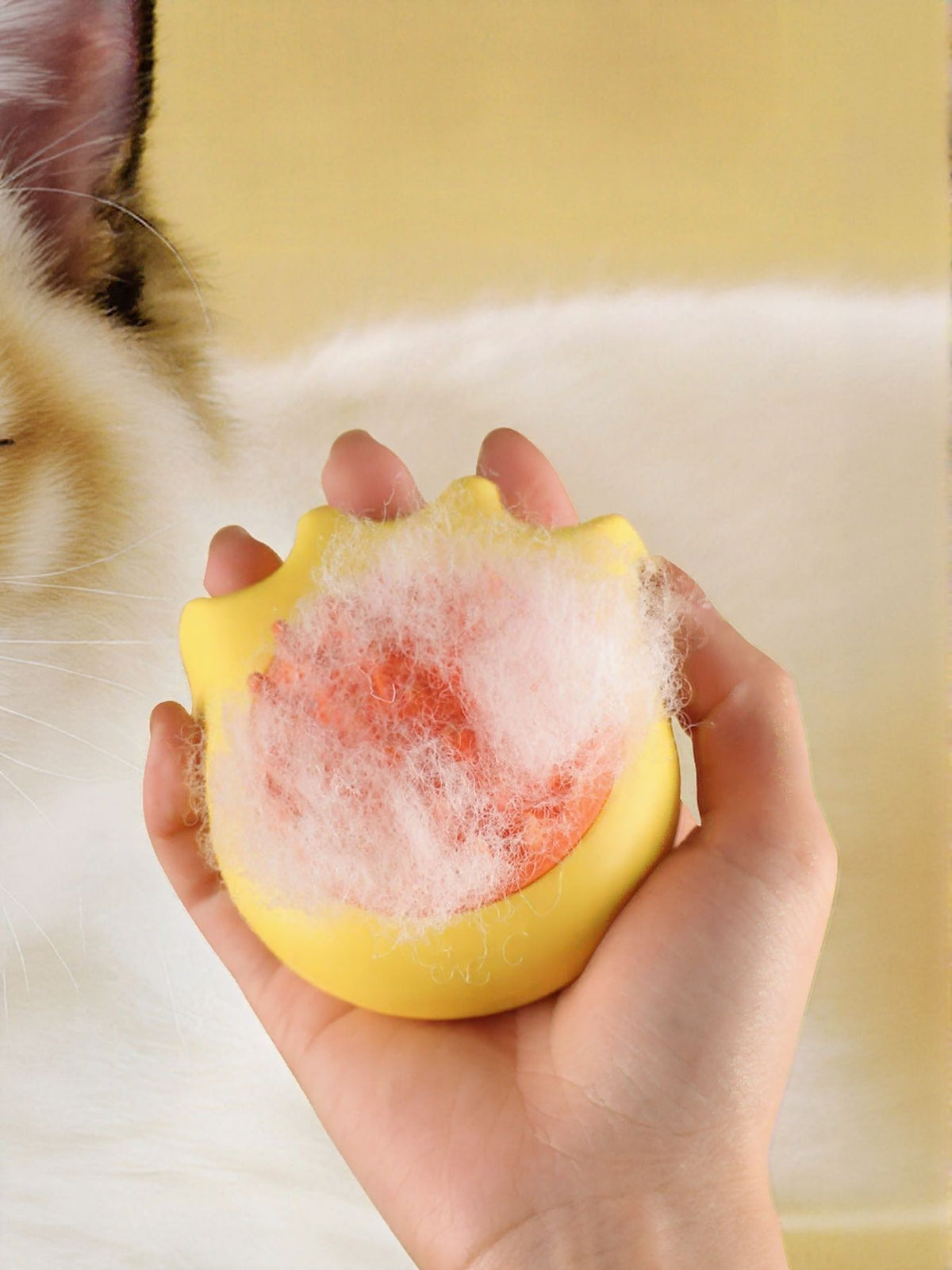 Soft pet shower brush by Trendsi with gentle bristles for bathing dogs and cats, shown in a close-up image.