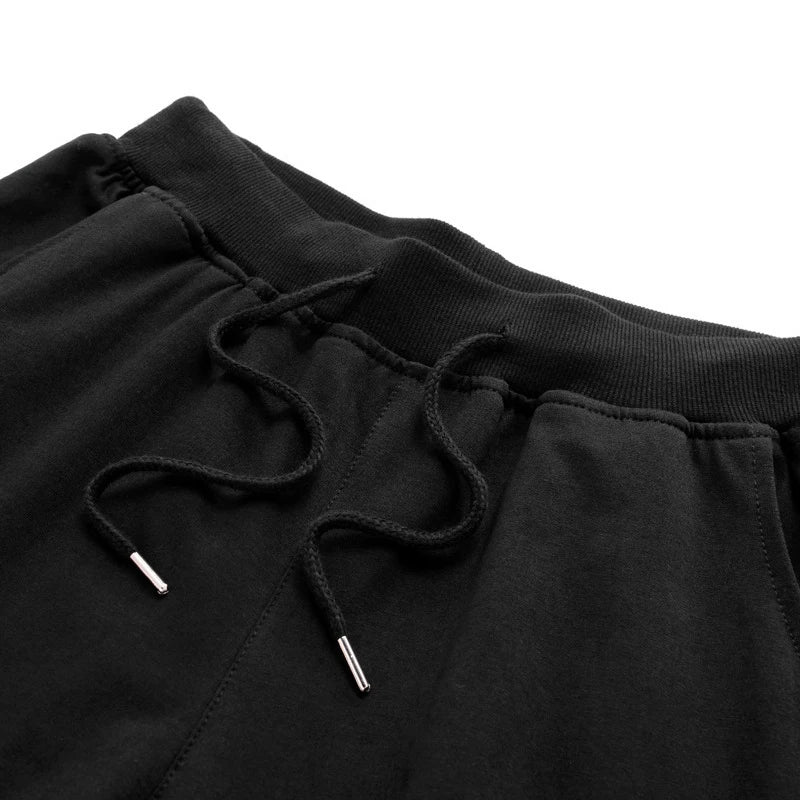 Pantalones cortos deportivos de hombre con cordón hasta la rodilla